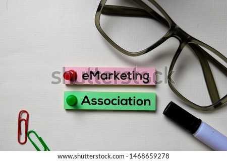 eMarketing Association - eMA text on sticky notes isolated on office desk