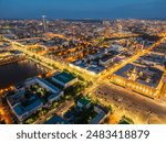 Embankment of central pond and Plotinka in Yekaterinburg at summer or early autumn night. Night city in the early autumn or summer. The historic center of the Yekaterinburg, Russia, Aerial View