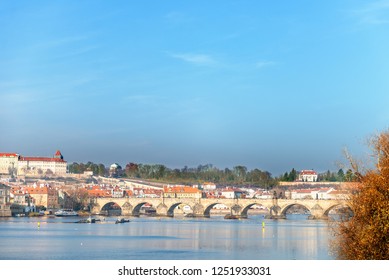 Embankment of the Vltava River and Karlov most, Charles bridge, in a sunny day, Prague, Czech Republic