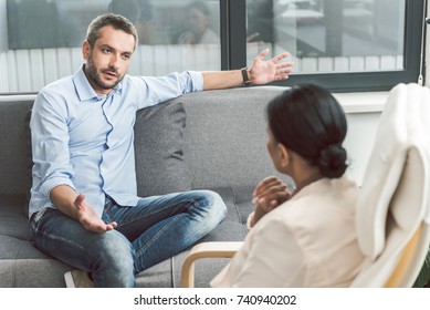 Embarrassed Male Visitor Of Psychotherapist