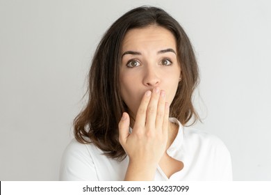 Embarrassed Young Woman Covering Mouth Hand Stock Photo 1306237099 ...