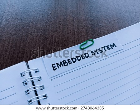 Embedded system writting on table background. 