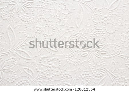Embossed Floral Pattern on White Paper