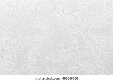 Embossed white paper with floral pattern. High quality texture in extremely high resolution.