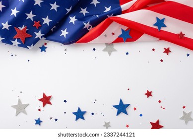 Embracing the spirit of the American federal holiday: top-down photograph showcasing American flag with sparky stars on white background. Ample copy-space for adverts or text during the celebration