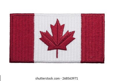 An Embroidered Canadian Flag Patch Isolated On A White Background.