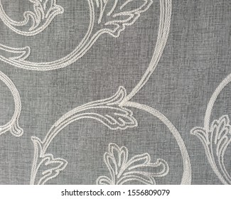 Embroidered Flowers On Delicate Sheer White Fabric