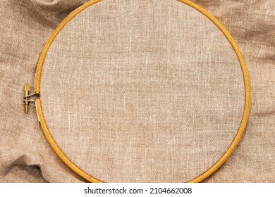 Embroidery Hoop With Natural Linen Fabric. View From The Top Of The Mockup.