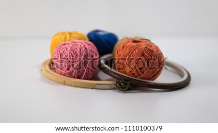 Embroidery Hoops and Balls of Threads
