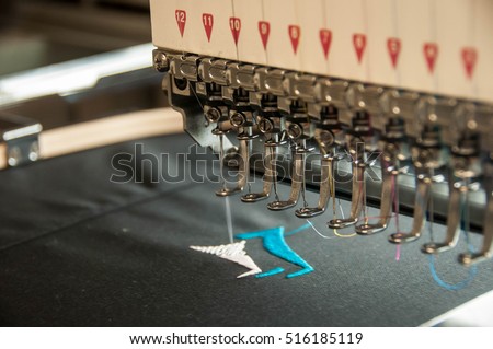 embroidery machine stitching a logo 