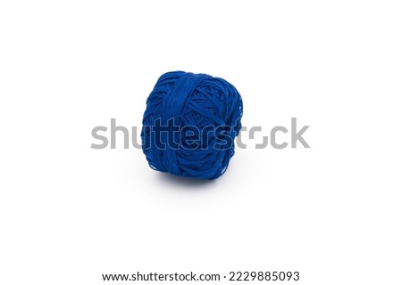 Embroidery thread roll in darkblue color on white background