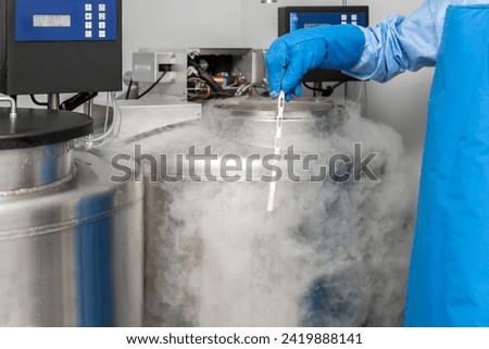 Embryologists a Liquid Nitrogen Bank Containing Sperm and Eggs Samples. ivf  in vitro fertilization, egg freezing. Sperm cryopreservation. Sperm freezing.