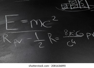 e=mc2 formula on blackboard, general theory of relativity formula, Einstein