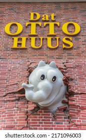 EMDEN, GERMANY - JUNE 21, 2022: Comic Book Elephant Breaking Through The Wall Od The Historic Otto House In Emden, Germany