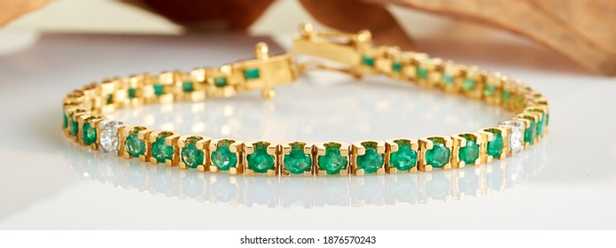 Emerald Gold Diamond Bracelet On Background