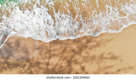 Emerald Green Sea And Orange Sand.
Look From The Top Corner Down.