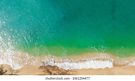 Emerald Green Sea And Orange Sand.
Look From The Top Corner Down.