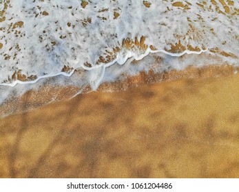 Emerald Green Sea And Orange Sand.
Look From The Top Corner Down.