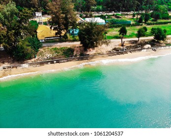 Emerald Green Sea And Orange Sand.
Look From The Top Corner Down.