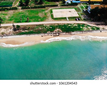 Emerald Green Sea And Orange Sand.
Look From The Top Corner Down.