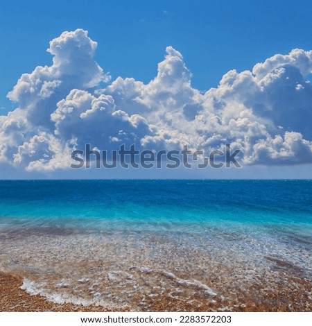 emerald sea bay under a dense cumulus clouds, summer sea vacation scene