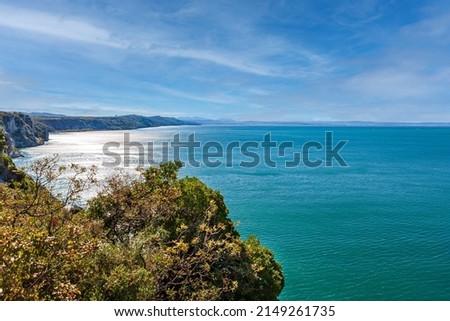 The emerald-colored Adriatic Sea near Duino, Gulf of Trieste, Italy. Light wind