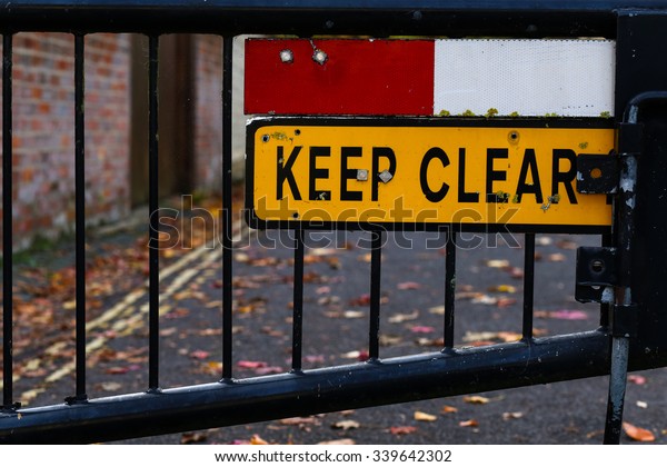 \'Emergency Access Keep Clear\' Sign gated street\
close up Jowett Walk Oxford,\
England.