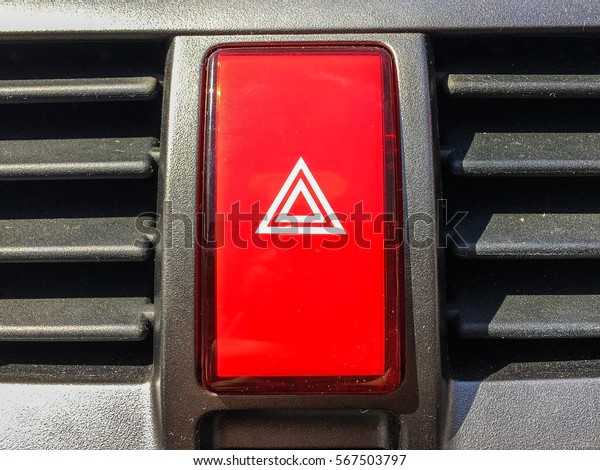 Emergency button in car,\
the sign closeup