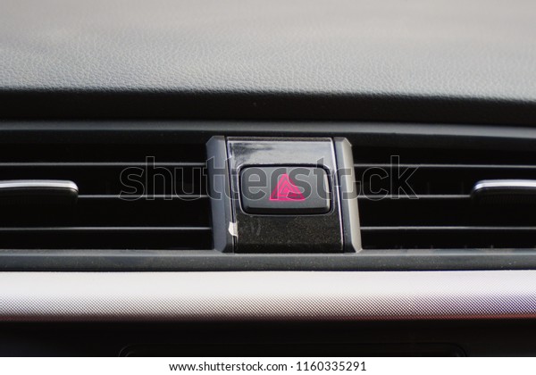 Emergency button on the car panel. Alarm button in\
the car