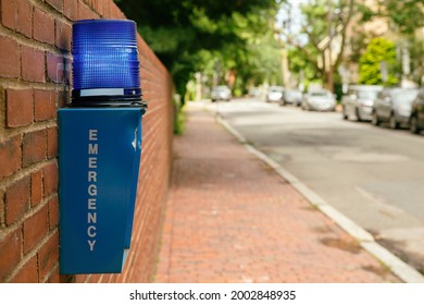 Emergency Button Outdoor In The City Street. Blue Box With Alarm System And Blue Warning Light On The Top. Copy Space