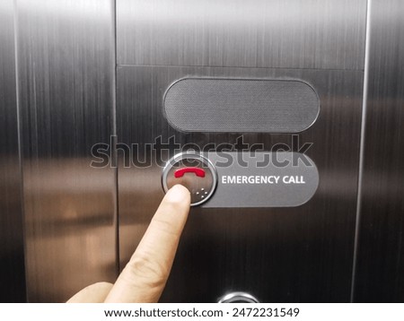 Emergency call button in the elevator