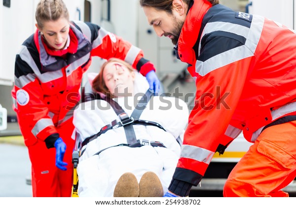 Emergency Doctor Nurse Ambulance Team Transporting Stock Photo ...