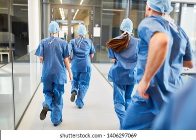Emergency doctors team is rushing to the rescue center in the hospital - Shutterstock ID 1406297069