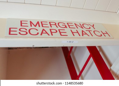 Emergency Escape Hatch Sign