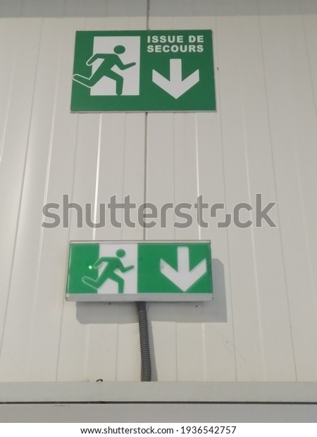 emergency
exit to the company symbol in case of
alert
