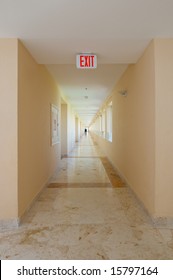 Emergency Exit Sign In Hotel Hallway