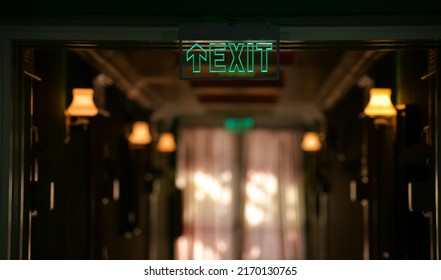 Emergency Exit Sign On The Hallway Of A Hotel