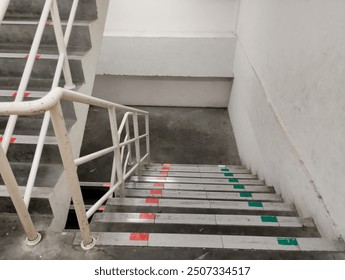 Emergency exit stairs, fire escape stairs inside the high building such as hotels, apartments, malls, etc. - Powered by Shutterstock