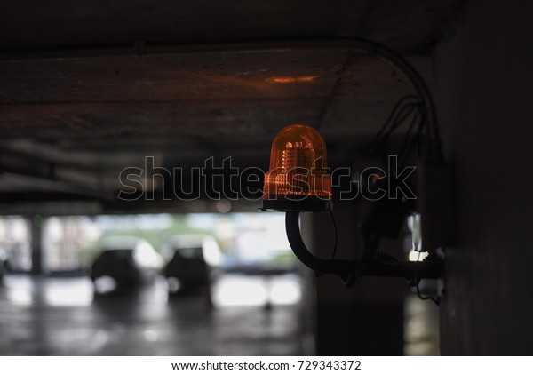 Emergency light on car parking\
lot