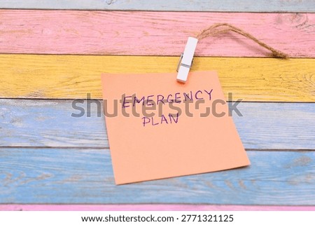 emergency plan write on rustical wooden background