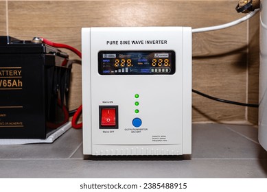 Emergency power supply with a 12V 65Ah battery providing uninterrupted pure sinusoidal alternating voltage of 230 Volt. - Powered by Shutterstock