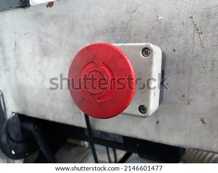  Emergency push button. Mushroom head buttonfor the prevention or reduction of injury damage. Safety in the workplace, safety of simple and complex operating machines.