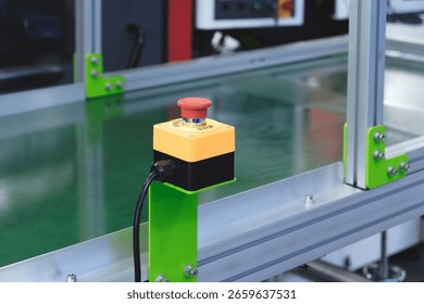 Emergency red button to stop processing industrial conveyor