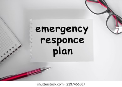 Emergency Responce PLAN . The Notebook Is On Paper With Text . Eyeglasses. Concept Photo.