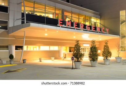 Emergency Room Entrance At A Hospital At Night.