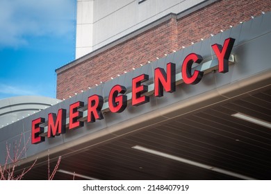 An Emergency Sign Above A Hospital's Emergency Department Entrance.