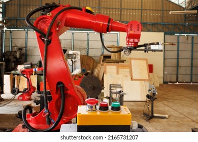 Emergency Stop Button With Blur Background In Industry Factory. Start Stop Button Control Welding Robot Blur Background.