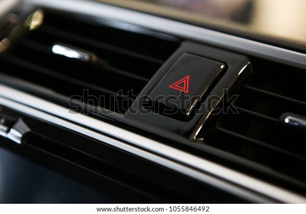 Emergency stop button in car. Warning of the danger and
stop. 