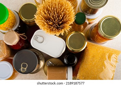 Emergency Survival Food Set On White Kitchen Table High Angle View