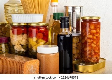 Emergency Survival Food Set On White Kitchen Table